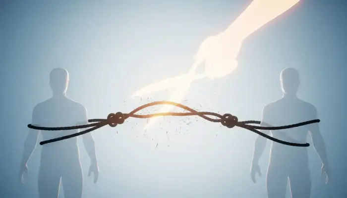 Illustration symbolique de la libération des croyances limitantes, avec des liens sombres en train d'être coupés.